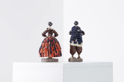 Lot 319 - A pair of papier mâché shell dolls