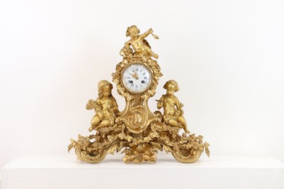 Lot 645 - A gilt-bronze mantel clock