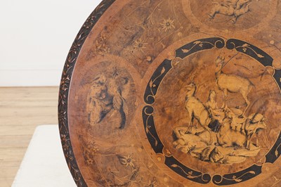 Lot 634 - A Black Forest carved wood occasional table