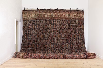Lot 450 - A very large Persian wool carpet