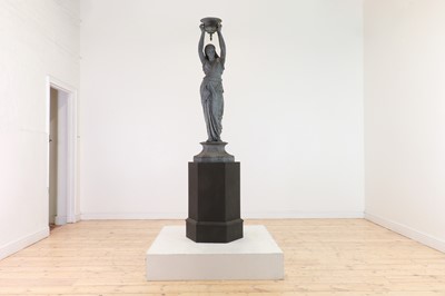 Lot 41 - A patinated spelter figure in the manner of Émile Guillemin