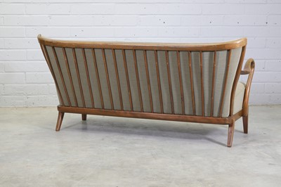 Lot 227 - A Danish Modern spindle-backed beech settee