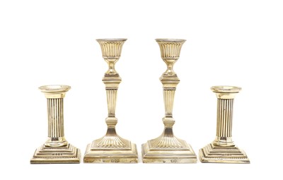 Lot 77 - A pair of silver candlesticks