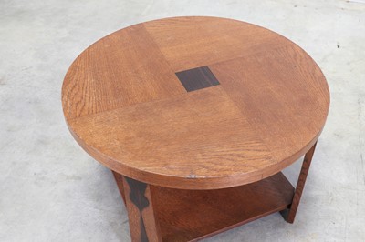 Lot 180 - An oak centre table