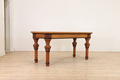 Lot 513 - A golden oak library table