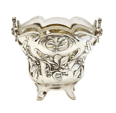 Lot 2 - A German silver swing handled bonbon dish