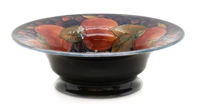 Lot 153 - A William Moorcroft pottery 'Pomegranate' pattern bowl
