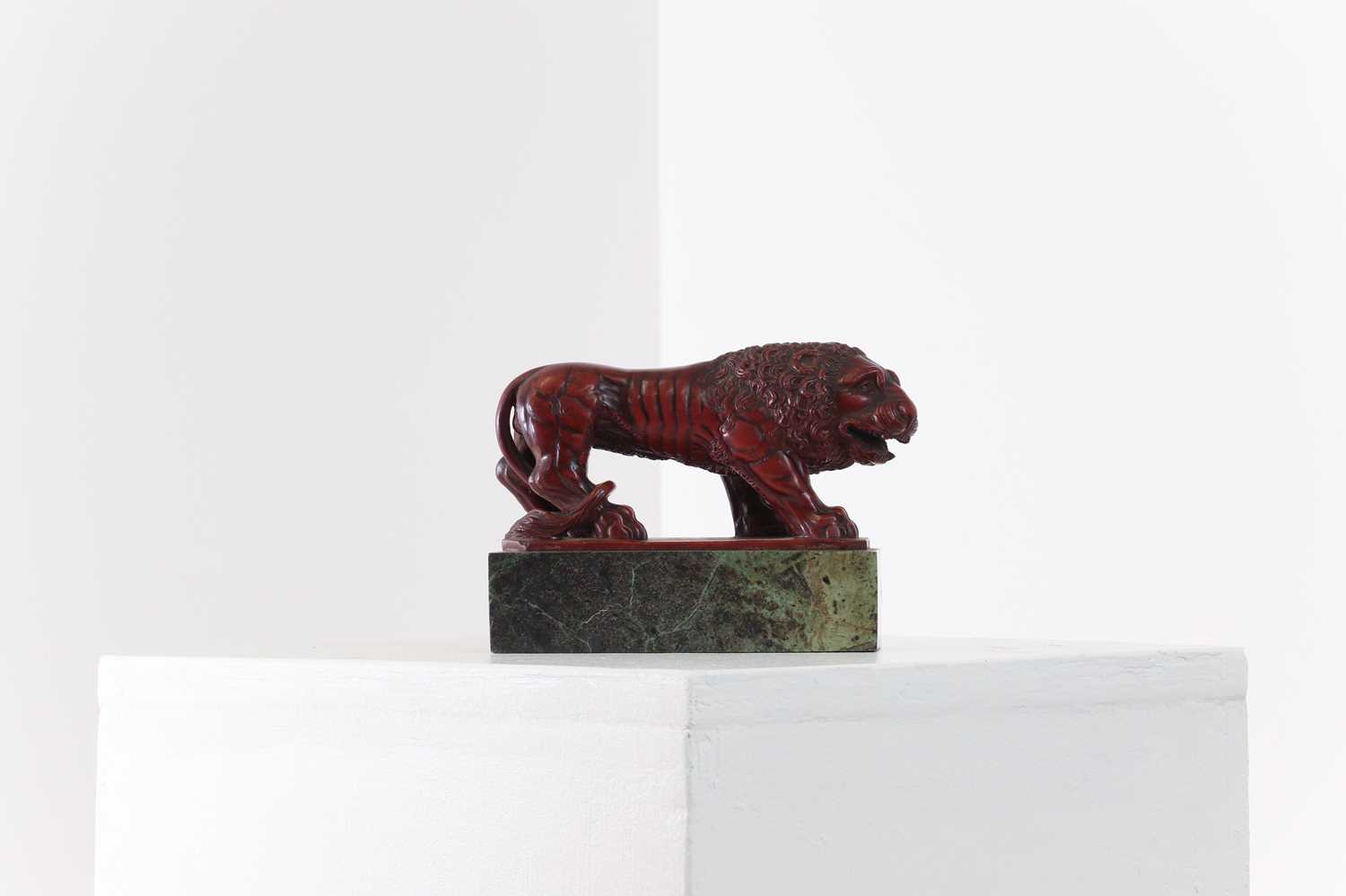 Lot 67 - A grand tour rosso antico marble model of a lion