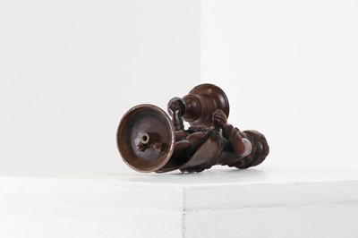 Lot 167 - A bronze figural candlestick