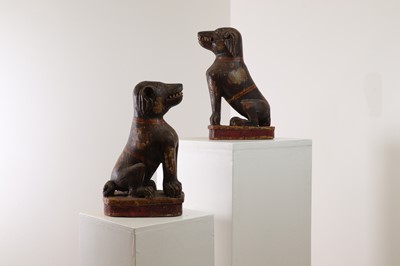 Lot 372 - A pair of painted wooden dogs