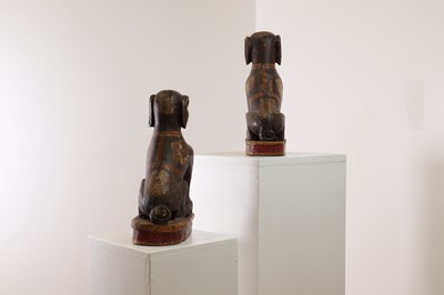 Lot 372 - A pair of painted wooden dogs