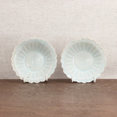 Lot 51 - A pair of Chinese qingbai-glazed saucers