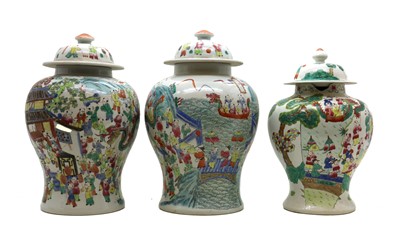 Lot 81 - Three Chinese famille rose jars and covers