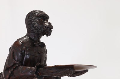 Lot 165 - A pair of large carved walnut monkey waiters