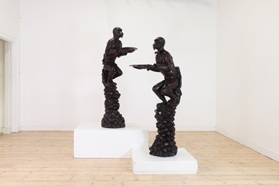 Lot 165 - A pair of large carved walnut monkey waiters