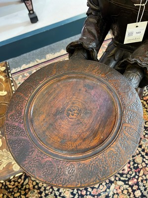 Lot 165 - A pair of large carved walnut monkey waiters