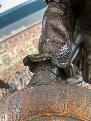Lot 165 - A pair of large carved walnut monkey waiters