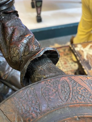 Lot 165 - A pair of large carved walnut monkey waiters