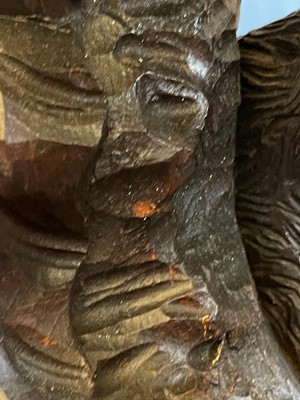 Lot 165 - A pair of large carved walnut monkey waiters