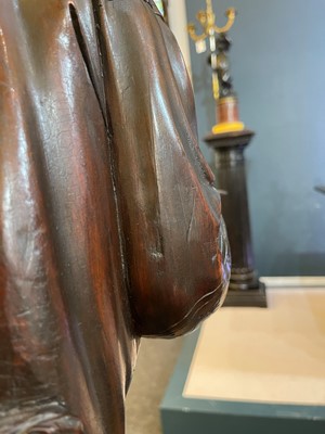 Lot 165 - A pair of large carved walnut monkey waiters