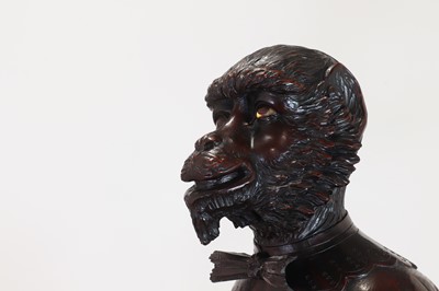 Lot 165 - A pair of large carved walnut monkey waiters