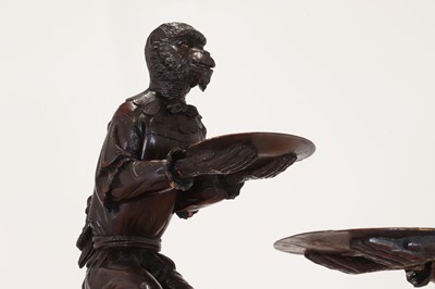 Lot 165 - A pair of large carved walnut monkey waiters