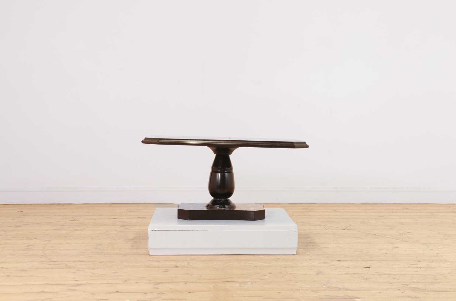 Lot 239 - An Ashford black marble low table by William Arden of Buxton