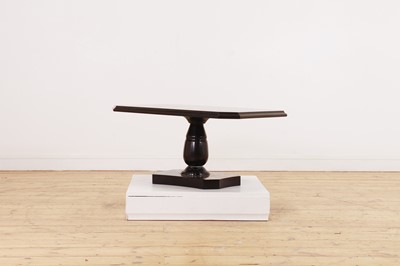 Lot 239 - An Ashford black marble low table by William Arden of Buxton