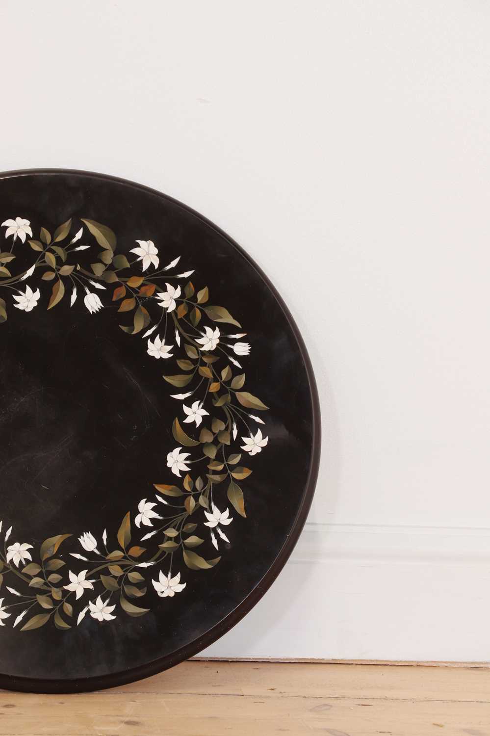 Lot 253 - An Ashford black marble occasional table
