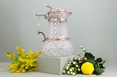 Lot 126 - A silver-mounted cut-glass lemonade or water jug
