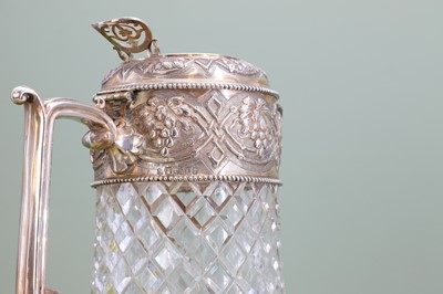 Lot 126 - A silver-mounted cut-glass lemonade or water jug