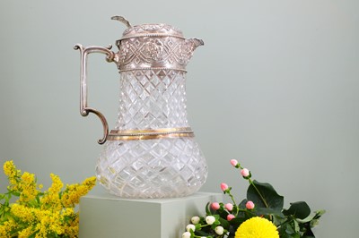 Lot 126 - A silver-mounted cut-glass lemonade or water jug