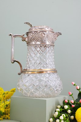 Lot 126 - A silver-mounted cut-glass lemonade or water jug