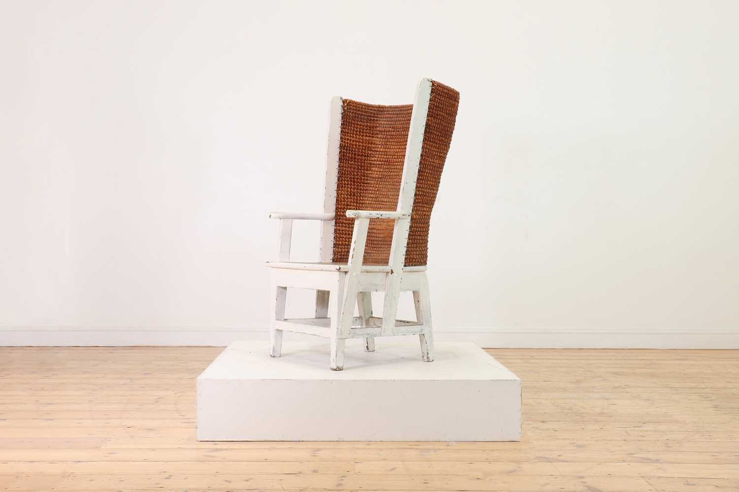 Lot 89 - A pine, straw and seagrass armchair