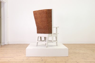 Lot 89 - A pine, straw and seagrass armchair