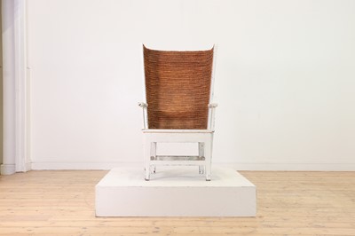Lot 89 - A pine, straw and seagrass armchair