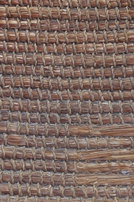 Lot 89 - A pine, straw and seagrass armchair