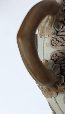 Lot 73 - A pair of Wedgwood jasperware urns and covers