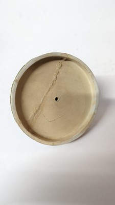 Lot 73 - A pair of Wedgwood jasperware urns and covers