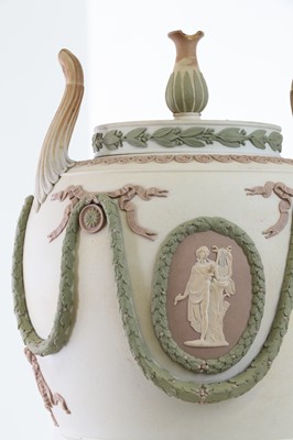 Lot 73 - A pair of Wedgwood jasperware urns and covers