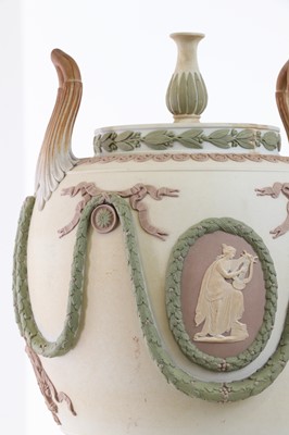 Lot 73 - A pair of Wedgwood jasperware urns and covers