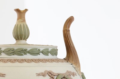 Lot 73 - A pair of Wedgwood jasperware urns and covers