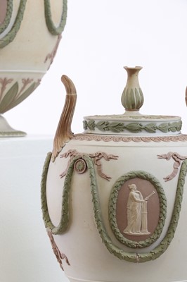 Lot 73 - A pair of Wedgwood jasperware urns and covers