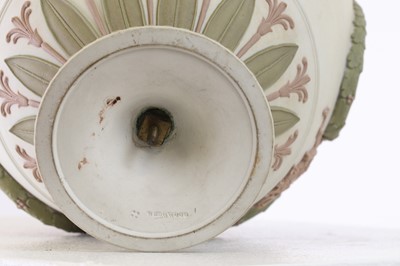 Lot 73 - A pair of Wedgwood jasperware urns and covers