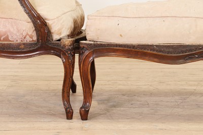 Lot 72 - A Louis XV carved walnut duchesse brisée