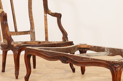 Lot 72 - A Louis XV carved walnut duchesse brisée