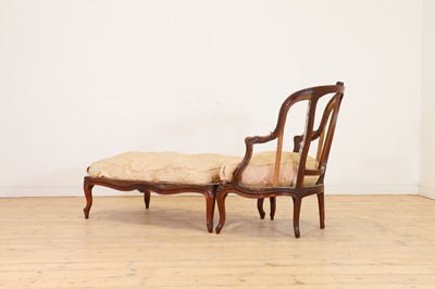 Lot 72 - A Louis XV carved walnut duchesse brisée