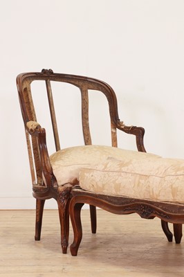 Lot 72 - A Louis XV carved walnut duchesse brisée