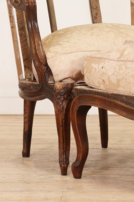 Lot 72 - A Louis XV carved walnut duchesse brisée