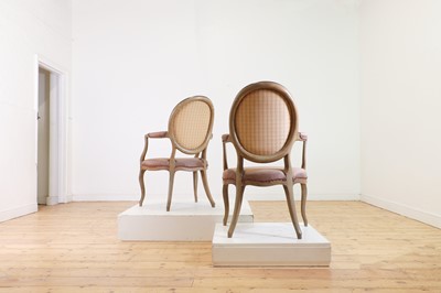 Lot 45 - A pair of George III-style painted open armchairs
